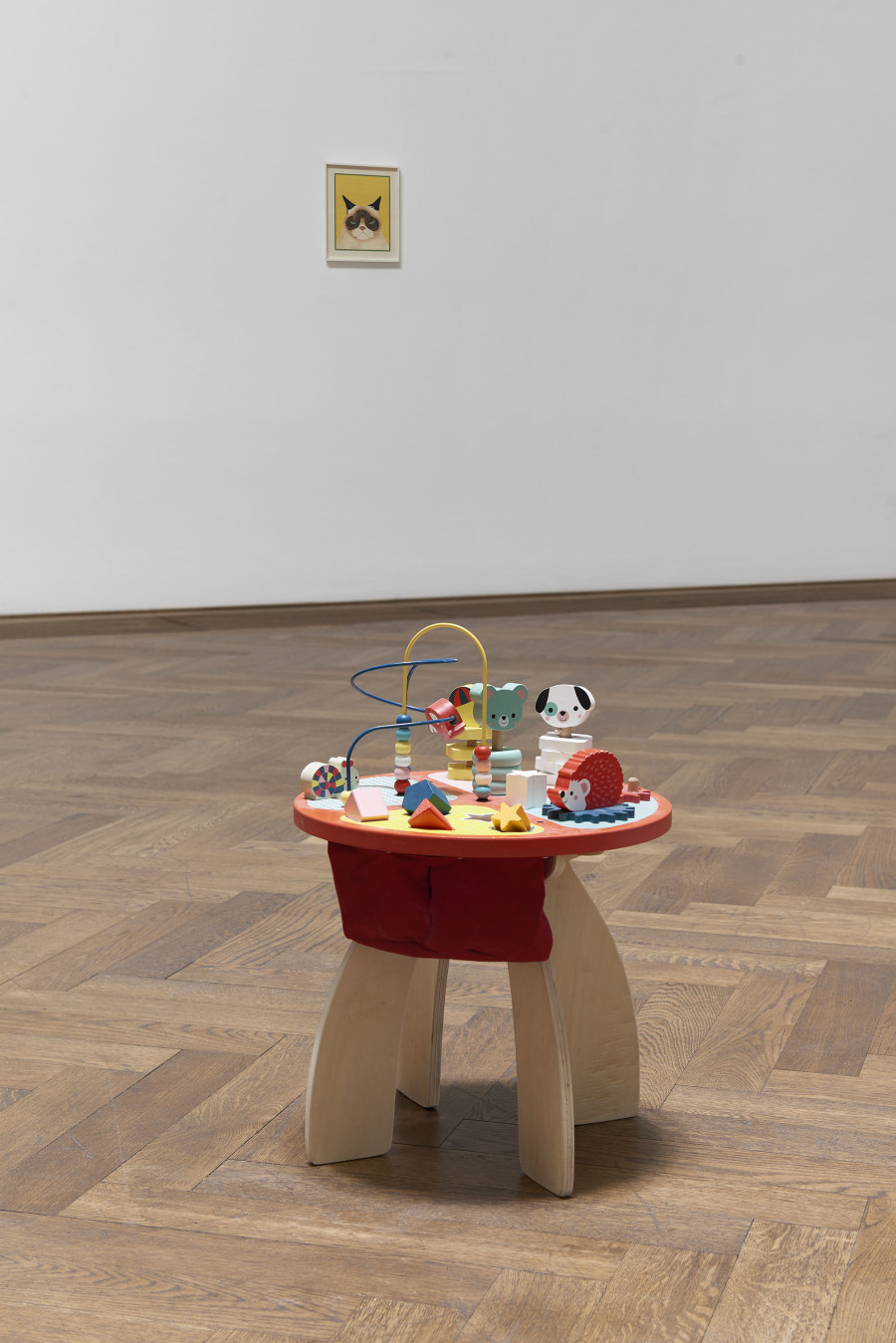 Camille Blatrix, installation view, Standby Mice Station, Kunsthalle Basel, 2020, view on Baby Forest Activity Table – Janod® (front) and Grumpy Cat (Summer), 2020 (back). Photo: Philipp Hänger / Kunsthalle Basel. Courtesy of the artist; Galerie Balice Hertling, Paris, and Andrew Kreps Gallery, New York