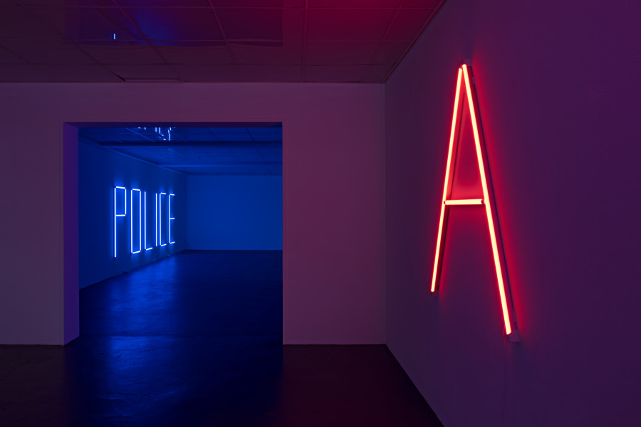 Anne-Lise Coste, POLICE, 2022, Neon, 153 x 528.5 cm. A, 2022, Neon, 122 x 142,5 cm. Courtesy: Galerie Elisabeth & Reinhard Hauff, Ellen de Bruijne, NoguerasBlanchard, Lullin + Ferrari, CAN Christina Androulidaki Gallery. Ausstellungsansicht/Installation view Kunsthaus Baselland 2022. Foto/Photo: Gina Folly