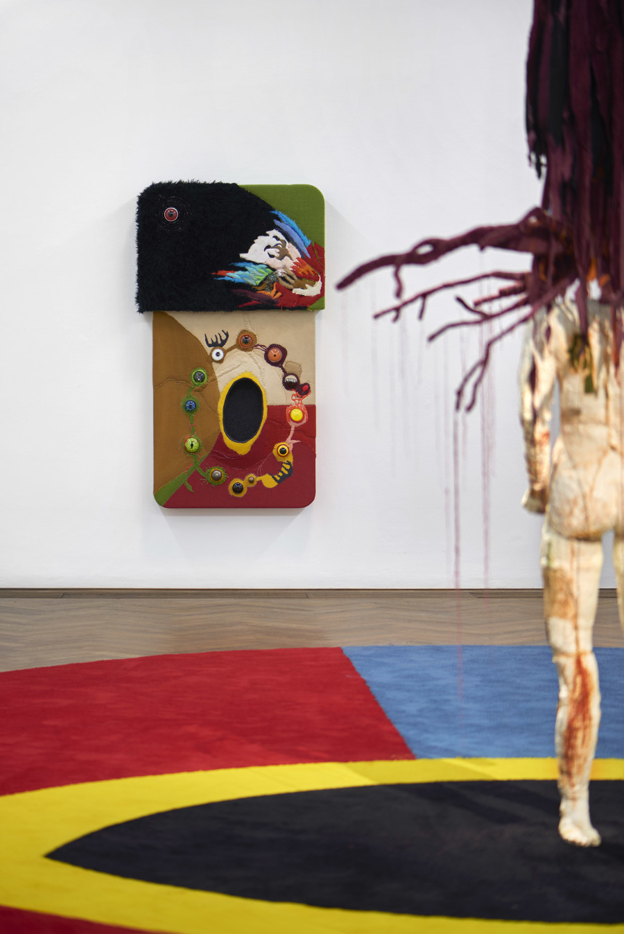 Installation view, Pedro Wirz, Environmental Hangover, Kunsthalle Basel, 2022, view on Coro de Princesa (Amarelão), 2022 (left), Chapéu Telúrico, 2022 (right), Ovo Espacial, 2022 (floor). Photo: Philipp Hänger / Kunsthalle Basel