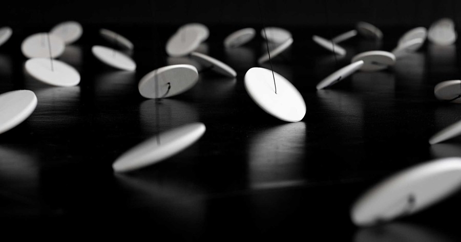 Zimoun, 225 prepared dc-motors, 720 m rope, wooden discs ø 100 mm, Installation view Saasfee* Pavillon, Frankfurt, Germany, 2019. Photo: Zimoun