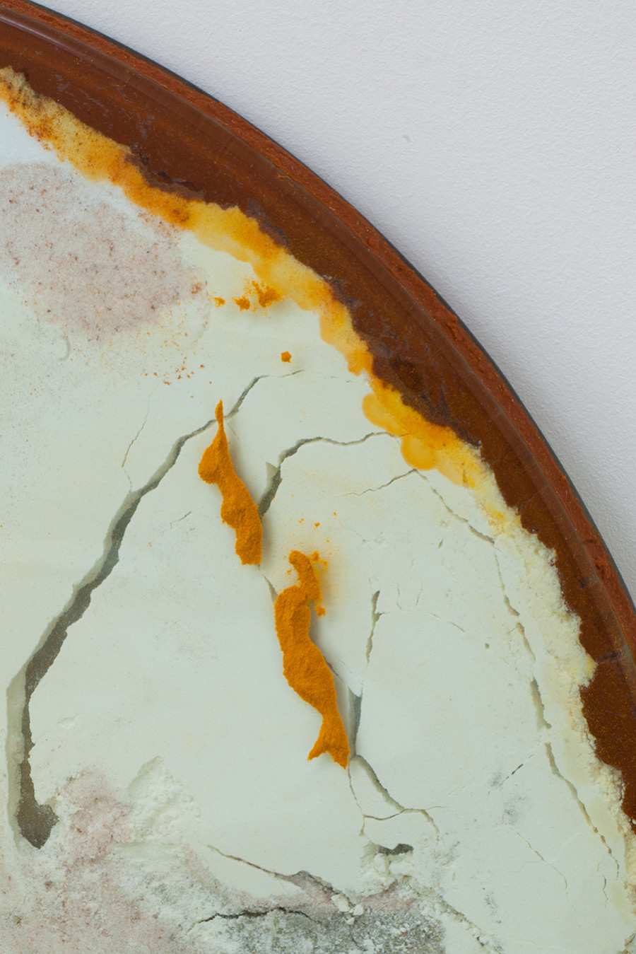 Monia Ben Hamouda, The Luncay of Lunar Sightings (Hourglass III) (detail), 2022, Glass, chilli pigmented silicon, spices, 80 x 80 x 3.5 cm. From the solo show The Eye, the Hands, the Lunacy of Lunar Sightings, curated by Anissa Touati, jevouspropose, Zurich, 2022. Courtesy of the artist and ChertLüdde, Berlin