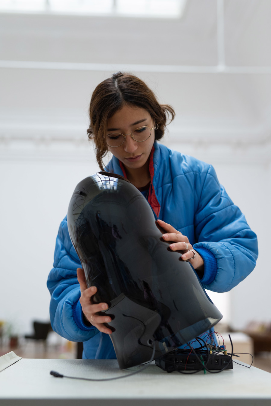 Lydia Ourahmane during install of the exhibition Barzakh, Kunsthalle Basel, 2021. Photo: Dominik Asche / Kunsthalle Basel