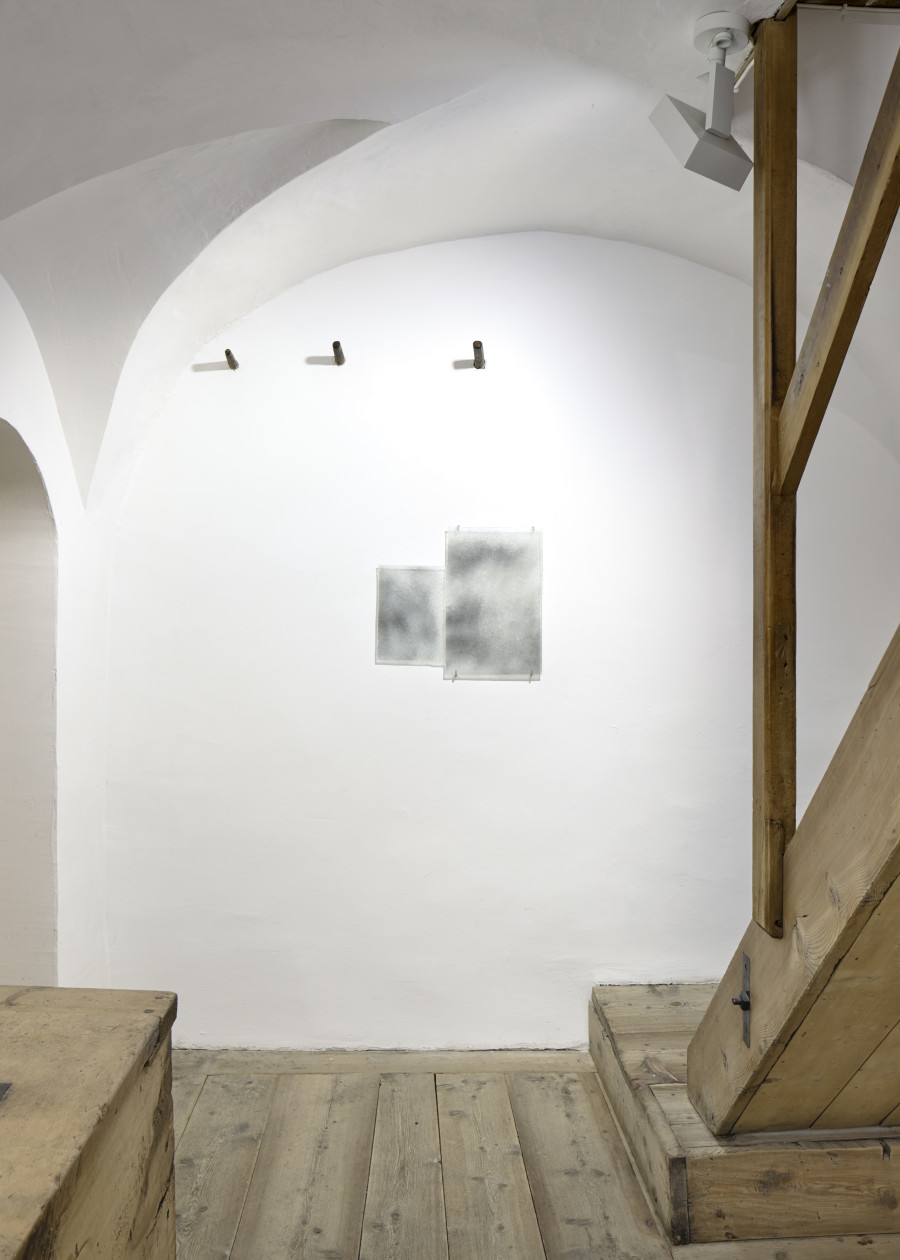 Exhibition view, Augustas Serapinas, Window Glasses from a House from Skirgiškės or Didžioji Kuosinė, 2022, window glasses with old nails powde, 45 cm x 49 cm x 0.5 cm. Photo: Ralph Feiner, Courtesy of the artist and Galerie Tschudi