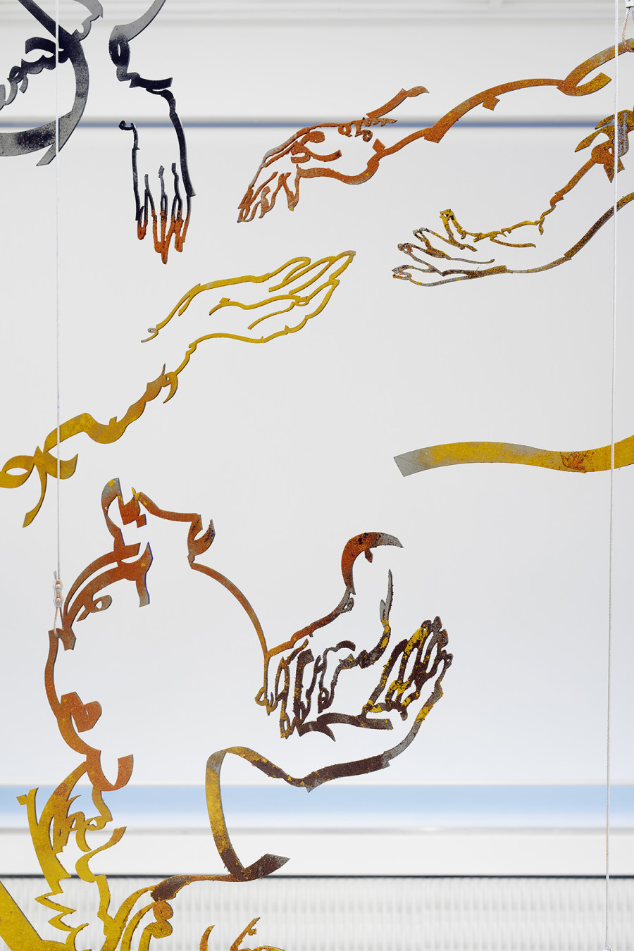 Monia Ben Hamouda, Aniconism as Figurative Urgency (the Eye, the Hands) (detail), 2022, Laser cut steel, spice powders, ca 256 x 290 x 0.3 cm. Installation view from the solo show The Eye, the Hands, the Lunacy of Lunar Sightings, curated by Anissa Touati, jevouspropose, Zurich, 2022. Courtesy of the artist and ChertLüdde, Berlin, photo: Hannes Heinzer