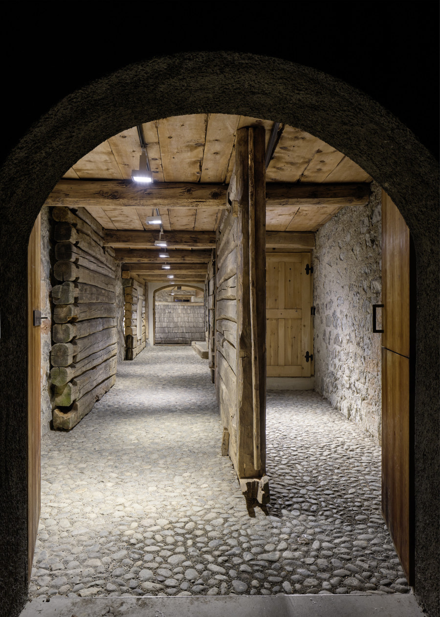 Exhibition view, Augustas Serapinas, House Wall from Didžioji Kuosinė, 2022, reclaimed wood. Photo: Ralph Feiner, Courtesy of the artist and Galerie Tschudi
