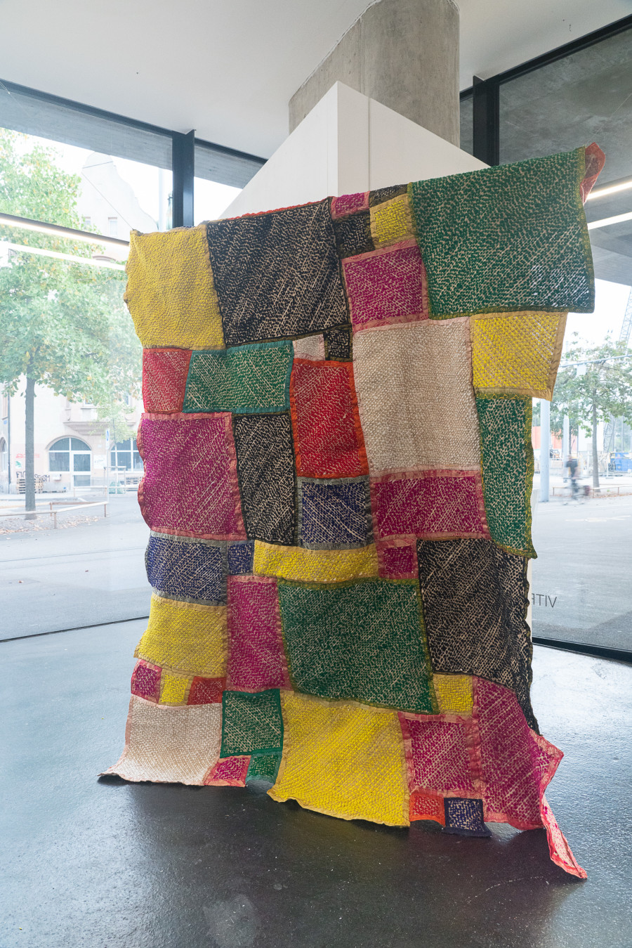 Ashfika Rahman, Redeem (Natore), 2021. Stitching on ‘Burlap’ (a local handmade fabric made by the indigenous community Natore) with recycled Saree and Dhoti. 233 x 173 x 12 cm. Unique.