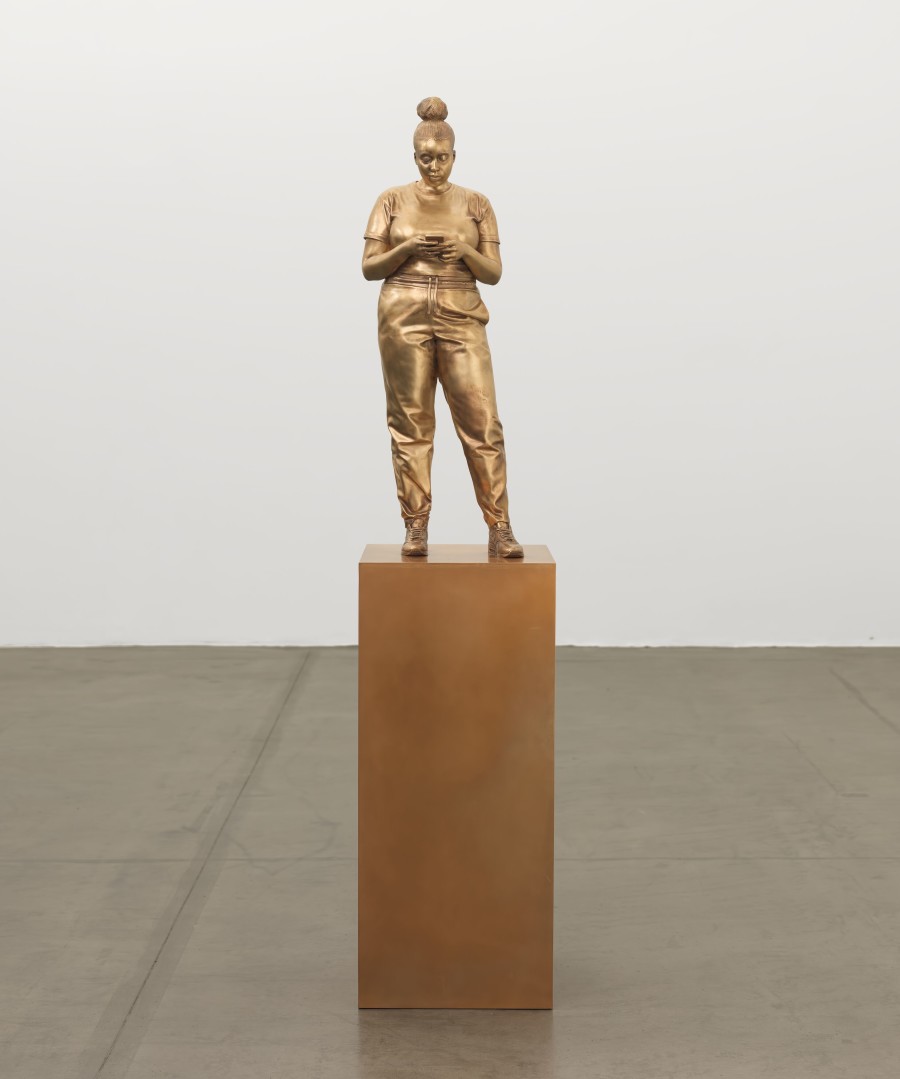 Thomas J Price, Reaching Out, 2021, Bronze (Golden patina), 177 x 37 x 37 cm / 69 5/8 x 14 5/8 x 14 5/8 in, PRITJ111951. © Thomas J Price. Courtesy the artist and Hauser & Wirth. Photo: Ken Adlard