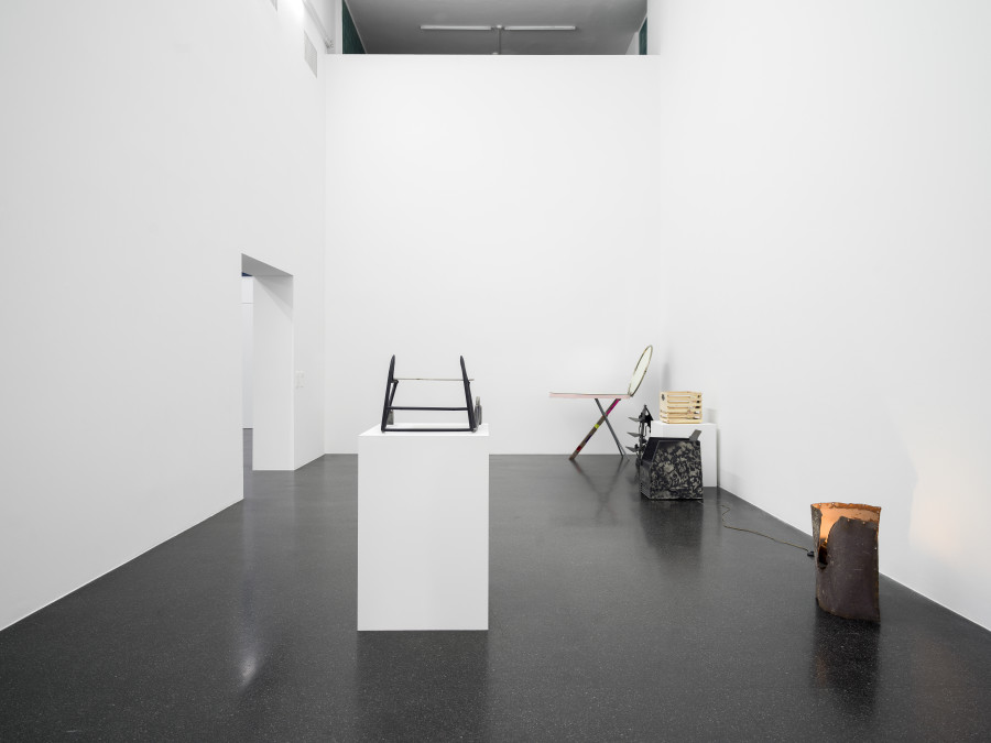 Dozie Kanu, aro pillars chukwu dinners (detail), 2022, Found steel pipes, burnt pine wood, spray paint, powder-coated steel keyhole plates, 45 x 65 x 76 cm